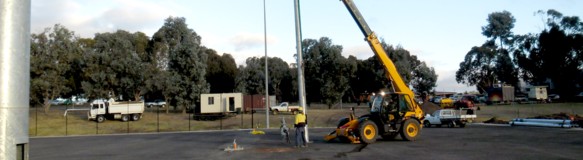 Erection of electric light poles